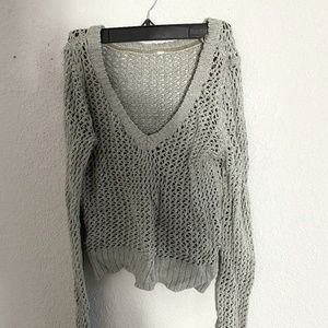 Knitted gray sweater.